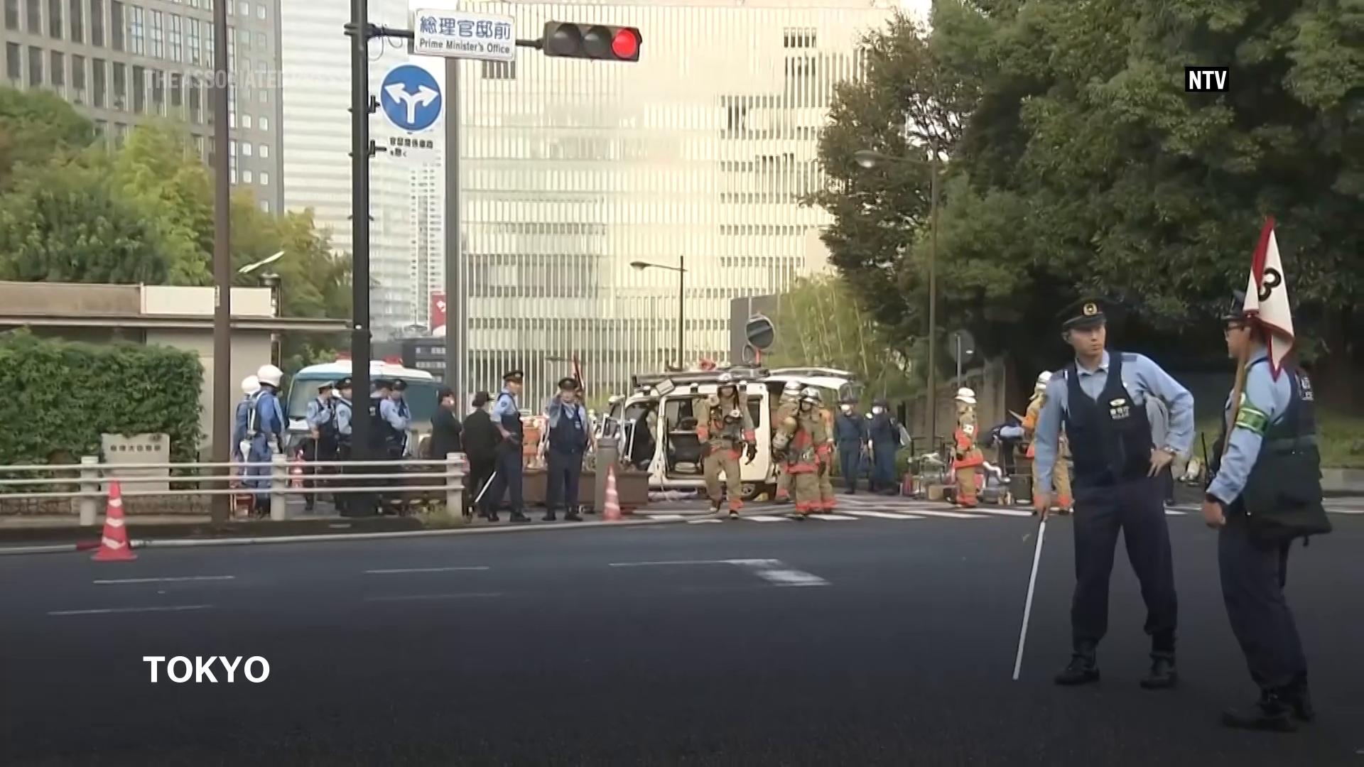 Japan's ruling party headquarters is attacked with firebombs and